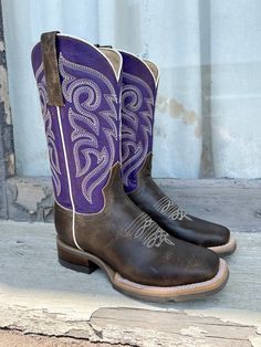 Check out this great looking pair of boots by Roper! For you purple loving cowgirl's like myself, this is a great riding/barn boot or just a nice everyday square toe boot for rocking with your favorite jeans. Square Toe  Brown Leather Vamp Removable Insole   Rubber Outsole 11” Shaft Height 1.5" Block Heel 15" Circumfer Purple Quince Boots, Purple Western Outfit, Purple Cowgirl Boots, Square Toe Boots Cowgirl, Purple Cowboy Boots, Square Toe Cowgirl Boots, Dream Quinceanera, Quince Planning, Western Footwear