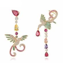 Seymour Asymmetrical Crystal Phoenix Bird Dangle Statement Earrings – ANN VOYAGE Trending Earrings, Travel Inspired Jewelry, Crystal Jewelry Necklaces, Fish Earrings, Phoenix Bird, Earring Trends, Animal Earrings, Dream Jewelry, Champagne Gold