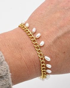 Attention all fashionistas and ocean lovers, prepare to set sail on a journey of luxury and style with the breathtaking Lana Bracelet 🐚

✨Crafted from 14 karat gold filled metal, this stunning bracelet is not only highly durable but also waterproof, making it the perfect accessory for any beach day or boat trip. 

Shop Now! www.shopsculptress.com

#pearlbracelet #pearljewelry #pearl #mermaid #surfergirl #roxy #surfjewelry #waterproofjewelry Elegant Dangle Pearl Charm Bracelets, Adjustable Gold Bracelet With Pearl Charm, Adjustable Gold Pearl Chain Bracelet, Adjustable Gold Pearl Bracelet With Pearl Charm, Dainty Gold Plated Oyster Bracelet, Dainty Gold-plated Oyster Bracelet, Pearl Chain Bangle Bracelets, Elegant Gold Dangle Pearl Bracelet, Gold Bangle Bracelet With Pearl Drop