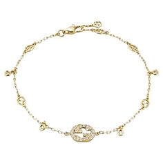 Gucci Interlocking G 18ct Yellow Gold 0.20ct Diamond Bracelet YBA729403002017 The Interlocking G jewellery collection takes a cue from the geometric logo, resulting in this design. Sparkling with Interlocking G details and set with diamonds, the 18ct yellow gold bracelet is ideal for everyday wear. - 18ct yellow gold - 30 diamonds, approximately 0.2ct - Interlocking G - Made in Italy Gucci White Gold Jewelry With Diamond Accents, Gucci Jewelry With Diamond Accents For Gift, Gucci Fine Jewelry With Diamond Accents, Gucci Diamond Jewelry With Diamond Accents, Gucci Yellow Gold Bracelet For Formal Occasions, Gucci Elegant Yellow Gold Bracelet, Gucci Gold Jubilee Bracelet Jewelry, Designer Yellow Gold Diamond Bracelet, Gucci Gold Jubilee Bracelet