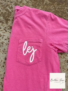 *New New New* 🖤3D Puff Embroidered Pocket Monogram T-Shirt 🖤  Customize this soft and comfy T-shirt! Choose your monogram font style, T-shirt color and thread color! Pocket T-Shirt Features: -Brand: Comfort Colors - 100% Soft Ring-Spun Cotton -Unisex Relaxed Fit Pocket T-Shirt -Sizes: S - 3XL -Available in a variety of colors - (Colors/shades may vary from shirt to shirt due to the pigment dye process.) -Made with OEKO-TEX certified low-impact dyes. -3D Puff Embroidery - Embroidery foam is added to enhance the design to give it that 3D Puff look. -Embroidery foam is water-resistant, non-toxic, and can be machine washed. *Note: Pocket is sewn shut due to embroidery. *Pocket T-Shirts shown in photos:  1. Crunchberry  2. Monogram lowercase initials - lej 3. Cream thread color 1. Butter 2. M White Casual Monogram Top, Casual Cotton Monogram T-shirt, Pink Monogram Crew Neck Top, Pink Monogrammed Crew Neck Top, Pink Crew Neck Top With Monogram, Pink Monogram Cotton Top, Pink Monogrammed Cotton Top, Cute Short Sleeve T-shirt With Letter Embroidery, Casual Cotton Monogram Tops