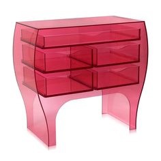 a pink acrylic dresser with six drawers and one drawer on the bottom shelf