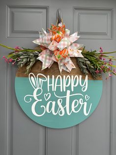 a happy easter wreath hanging on the front door