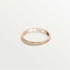 Cartier - Cartier d'Amour wedding band - Ring Woman Pink gold/Diamond - Cartier d'Amour wedding band, rose gold (750/1000), set with 56 brilliant-cut diamonds totaling 0.15 carat. Width: 2.3 mm (for size 52). Please note that the carat weight, number of stones and product dimensions will vary based on the size of the creation you order. For detailed information please contact us. Cartier Yellow Gold Diamond Wedding Ring, Cartier Yellow Gold Wedding Diamond Ring, Cartier Rose Gold Wedding Ring, Luxury Polished Diamond Ring For Wedding, Luxury Polished Finish Diamond Wedding Ring, Luxury Wedding Diamond Ring With Polished Finish, Cartier Diamond Promise Jewelry, Cartier Gold Wedding Rings, Cartier Diamond Jewelry For Promise