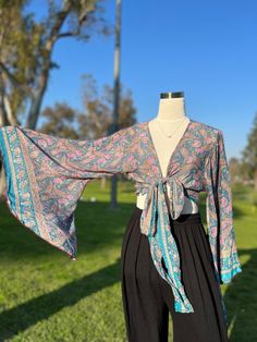 Handmade unique crop top.  Best for music festivals, beach, and casual.  Fits Sizes XS/S/M/L/XL/XXL Summer Wrap Blouse With Tie Sleeves, Bohemian V-neck Crop Top For Beach Season, Trendy V-neck Crop Top For Beach, Summer Beach Wrap Crop Top, Printed V-neck Crop Top For Summer, Bohemian Wrap Top For Day Out, Summer Festival Wrap Blouse, Summer Hippie Wrap Blouse, Summer Wrap Crop Top