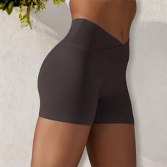 The Anna-Kaci Women's High Waist Seamless Ribbed Biker Shorts are a stylish and functional addition to your activewear collection. Made from soft, stretchy ribbed fabric, these biker shorts feature a high waist design that provides excellent support and a flattering fit. The seamless construction ensures maximum comfort and freedom of movement, making them perfect for workouts, yoga sessions, or casual wear. Pair these versatile shorts with a crop top, sports bra, or oversized tee for a chic and Stretch Biker Shorts With Seamless Construction, Stretch Solid Color Athletic Shorts, Stretch Solid Biker Shorts In Elastane, Solid Stretch Seamless Biker Shorts, Solid Fitted Seamless Biker Shorts, Functional Seamless Solid Color Shorts, Functional Solid Color Seamless Shorts, Compressive Shapewear Biker Shorts For Workout, Seamless Stretch Solid Biker Shorts