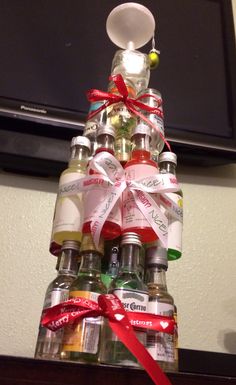 a christmas tree made out of liquor bottles