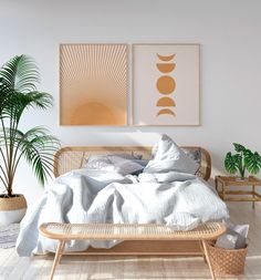 a bed with white sheets and pillows in a room next to two potted plants