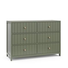 a green dresser with six drawers