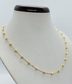 "14K YELLOW GOLD 3.5mm Diamond Cut Fancy Beaded chain These chains are made with solid 14k gold. The beads are 3.5mm in width and are connected with 1.5mm rolo style chain and is available in 16\", 18\", 20\",22\", 24\". Beaded chain are especially known for their shine. The chains are diamond cut and very shiny. Can be worn by itself or with a charm. The approximate weight of the 18\" is 8.4 grams. The chains have lobster claw for additional security. The chains have 14K marked for Authenticity 14k Gold Ball Chain Necklace, Yellow Gold Beaded Necklaces With Delicate Chain, Yellow Gold Beaded Necklace With Delicate Chain, Yellow Gold Plated Round Beaded Necklaces, Yellow Gold Plated Round Beads Chain Necklace, Yellow Gold Beaded Chain Necklace With Round Beads, Yellow Gold Plated Chain Necklace With Round Beads, Yellow Gold Beaded Chain Necklace, Yellow Gold Satellite Chain Necklace With Round Beads