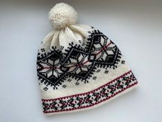 This winter hat with Norwegian pattern is extra warm, protecting a head in cold and windy weather. This winter hat has a wool inner making it comfortable to wear. This hat can be a perfect gift for Christmas. The hat is made of 100% natural wool from sheep, which assures natural and environmental friendliness. All wool items in my shop are washed - Ready to wear! Material: 100% wool Colours: -White/Black Sizes: *Head circumference: 54-56cm (21.26-22.05in) Hat height: 23cm (9.06in) *57-59cm (22.4 White Winter Hats For Cold Weather, Cream Beanie Bonnet For Winter, Warm White Bonnet For Cold Weather, Cream Winter Beanie, Cream Knitted Bonnet For Winter, Brimmed Winter Bonnet For Cold Weather, White Crochet Hat For Winter, White Warm Beanie For Winter, White Winter Bonnet