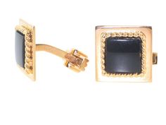 Subtle Savoir Faire, these Charles Gold & Co. black onyx cufflinks are the height of class. A square black onyx is bordered by woven gold and set on a larger square of high-polish gold. These estate black onyx cufflinks were made by master jewelers Charles Gold & Co., who manufactured jewelry for Van Cleef and Arpels. Classic Onyx Jewelry For Formal Occasions, Luxury Black Cufflinks For Formal Occasions, Black Luxury Cufflinks For Formal Occasions, Black Luxury Cufflinks For Formal Wear, Luxury Black Formal Cufflinks, Classic Black Jewelry For Formal Occasions, Black Classic Jewelry For Formal Occasions, Luxury Rectangular Onyx Jewelry, Elegant Black Enamel Rectangular Jewelry