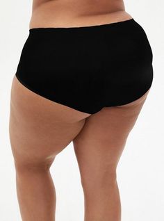 FIT Mid rise. Full coverage. MATERIALS + CARE Seamless knit fabric. 95% nylon, 5% spandex. Wash cold. Dry low. Imported. DETAILS Elastic waistband. WHY WE LOVE IT Soft and seamless, this brief panty stretches with you while disappearing under your most slim-fitting looks. The best plus size women's seamless smooth mid-rise brief panty sleep bottoms in black made of seamless. These comfy pajamas will be your favorite PJs to sleep in or lounge around. Compressive Nylon Black Bottoms, High Stretch Black Bottoms With Elastic Waistband, Black Elastic Seamless Bottoms, Black High Stretch Bottoms With Wide Waistband, Stretch Black Bottoms With Seamless Construction, Black Stretch Bottoms With Seamless Construction, Black Seamless Shapewear Bottoms, Black Smoothing Short Length Bottoms, Black Smoothing Short-length Bottoms