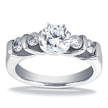 a white gold ring with diamonds on it