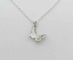 "Simple. Chic. Minimalist™ A perfectly dainty Sterling silver butterfly pendant is hanging on a delicate feminine Sterling silver chain. Butterfly measures 11mm. Model is wearing 16\" length The entire necklace is made with 100% Sterling silver! Also available with 14K Gold vermeil butterfly on a 14K Gold filled chain. ❤️ Personalize it! Add a tiny letter charm to the clasp- https://www.etsy.com/listing/240726946/add-a-personalized-letter-charm?ref=shop_home_active_1 I can add a beautiful wire w Silver Minimalist Butterfly Necklace With Adjustable Chain, Dainty Sterling Silver Butterfly Necklace, Delicate Silver Sterling Silver Butterfly Necklace, Delicate Butterfly-shaped Sterling Silver Jewelry, Dainty Butterfly-shaped Sterling Silver Necklace, Chain Butterfly, Butterfly Necklace Silver, Silver Butterfly Necklace, Jewelry Minimal