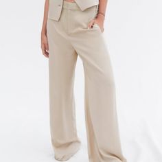 Side Pockets And False Back Welt Pocket. Wide Leg. Front Zip, Button, And Metal Hook Closure. Taupe Brown | Summer Business Casual Pants With Buttons, Business Casual Summer Pants With Buttons, Versatile Solid Pants With Button Closure, Versatile Solid Color Pants With Button Closure, Chic Dress Pants With Buttons, Chic Dress Pants With Button Closure, Chic High-waisted Dress Pants With Button Closure, Chic Straight Dress Pants With Buttons, Chic Wide Leg Pants With Buttons For Work