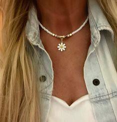 "This choker is 14 inches has a 2 inch extension and made out of Czech white glass beads,gold beads and a small (3/4\" diameter)ceramic daisy flower" Diy Earrings Box, Decades Dance, Ceramic Daisy, Short Necklaces, Turquoise Choker, Bead Earring, Signature Necklace, Dainty Choker, Surfer Necklace