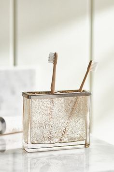 Lend sparkling style to your bathroom with this mercury glass toothbrush holder. | Vizcaya Toothbrush Holder by Anthropologie in Beige Brushed Nickel Bathroom Accessories, Ny Loft, Tooth Brush Holder, Cute Tooth, Brush Teeth Kids, Vermont Country Store, Bath Collection, Tooth Brush, Candles For Sale