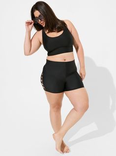 High Rise Strappy Side 3.5 Inch Swim Short Black Swimwear For Workout With 4-way Stretch, Athleisure Black Swimwear With 4-way Stretch, Black Athleisure Swimwear With 4-way Stretch, Black 4-way Stretch Swimwear For Yoga, Black Seamless Activewear For Spring, Black Compression Swimwear With Elastane, Black Compression Swimwear Elastane, Black Moisture-wicking Elastane Swimwear, Black Compressive Bottoms For Spring