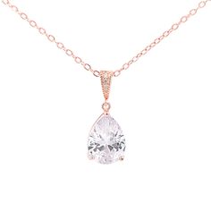 A simple, classic teardrop pendant is the perfect finishing touch for a bride, and can become a wardrobe staple after the wedding. - Made with simulated diamond stones- Available in silver, gold, or rose gold finish- Chain is 18" length with additional 2" extender- Pendant measures 1" length, 3/8" width- Stone measures 14mm x 10mm- Lightweight, easy to wear- Nickel and lead free- Securely packaged in a signature gift box with microfiber storage pouch- Easy returns Wedding Teardrop Pendant Necklace With Single Diamond, Gold Teardrop Pendant Diamond Necklace For Wedding, Gold Teardrop Necklace With Sparkling Stones, Elegant Rose Gold Teardrop Pendant Diamond Necklace, Gold Teardrop Pendant Necklace, Nickel Free, After The Wedding, Teardrop Pendant, Teardrop Necklace, Storage Pouch