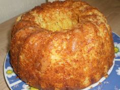 a bundt cake sitting on top of a blue and white plate