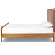 a wooden bed frame with white sheets and pillows on it, against a white background