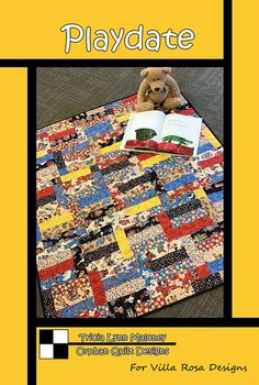 a teddy bear sitting on top of a quilted book cover with the title play date