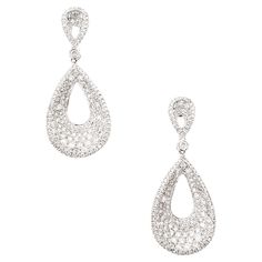 Embrace the brilliance of these dazzling 14 karat white gold diamond dangling earrings, a masterpiece of modern elegance. Each earring features a captivating 1.82 carat round-cut diamond, expertly set within a unique concave design, creating an enchanting play of light and shadow. The elongated and gracefully dangling silhouette of these earrings adds movement and allure to your every step, making them a perfect statement piece for any occasion. The 14 karat white gold setting enhances the radia Silver Diamond Cut Chandelier Earrings Fine Jewelry, Luxury Brilliant Cut Diamond Chandelier Earrings, Diamond Dangling Earrings, Luxury Exquisite Brilliant-cut Earrings, Luxury Diamond-cut Dangle Earrings, Luxury Multi-stone Dangle Chandelier Earrings, White Gold Set, Dangling Earrings, Round Cut Diamond