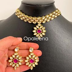 Stylish and exquisite ethnic - South Asian - Indian - Punjabi - Pakistani kundan choker bridal jewelry ruby stone jewelry Wedding guest choker set elegant kundan choker set gold plated kundan necklace set. Perfect gift for Mother's day. Necklace length: 24.7 cms  Necklace width: 4.9 cms String length: 35.5 cms approx Earrings length: 4.7 cms Earrings width: 3 cms Weight: 78 grams GIFT / PERSONALISED MESSAGE: Please provide the message within the NOTE TO SELLER section if you want to send this it Anniversary Kundan Necklace With Tilla Detailing, Kundan Necklace For Anniversary And Festivals, Kundan Necklace With Tilla For Anniversary And Festivals, Heavy Gold Kundan Necklace For Anniversary, Kundan Chandbali Necklace For Anniversary, Kundan Jewelry For Diwali Anniversary, Chandbali Kundan Necklace For Anniversary, Bollywood Kundan Jewelry For Anniversary, Temple Style Kundan Necklace For Anniversary