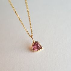 ✪Gold weight: 300 milligram ✪Stone size: 6 mm ✪Bail size: 5 mm ✪Without bail: 12 mm ✪Metal: 18k solid yellow gold ✪Gemstone: Pink tourmaline ✪Setting type: Bezel setting If you need any other preferred stone please contact us. QUALITY OF MATERIALS: Metal: Most of our jewelry at JewelryMansion is made with precious metals like gold and silver. These metals are 100% non-allergic to our skin. Gemstone: All of our jewelry is made by handpicked gemstones. Due to the nature of these gemstones a slight variation in colors may be noticed between the pictures and the real piece. Although we guarantee that this is barely noticeable. Real gemstones naturally consists of inclusions. In other words these gemstones may have very small barely noticeable cracks trapped inside the stones. This characterist Birthstone Gifts, October Birthstone, Handmade Pendant, October Birth Stone, Gold Charm, Handmade Pendants, Pink Tourmaline, Precious Metals, Favorite Jewelry