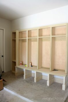 an empty room with some shelves in it