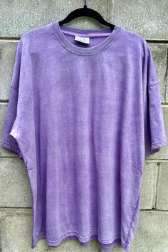 This Purple Haze oversized t-shirt will be your new go to t-shirt for sure. Oversized and perfect for dressing up for your Lavender haze era or dressing down to run errands. Please make sure to read the size chart, as there is no need to size up for an oversized look. Material: Custom Blend Fit: Oversized Neckline: Crew Neck Sleeve: Short Sleeve, Drop Shoulders Look: Acid Washed Extended Sizing: XS - 4XL Vintage Wash Cloud Black T-shirts, Soft Cotton Tee, Hipster Fashion, Mineral Wash Distressed Blank T-Shirt, Acid Wash Tee, DIY Shirt Alab Purple Shirt, Oversized Plain Short Sleeve T-shirt, Oversized Cotton Grunge T-shirt, Grunge Style Relaxed Fit Short Sleeve T-shirt, Oversized Short Sleeve Grunge T-shirt, Oversized Washed Cotton T-shirt, Cotton Short Sleeve Grunge Tops, Oversized Cotton Short Sleeve T-shirt, Oversized Purple T-shirt For Summer