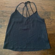 Beautiful Black Hollister Spaghetti Strap Top. Nwot Size Extra Small. Smoke Free Home. Bundle For More Savings. Bin 3 Black V-neck Top With Delicate Straps, Black Tops With Delicate Straps, Casual Vacation Tops With Delicate Straps, Casual Black V-neck Halter Top, Black V-neck Tank Top With Adjustable Straps, Black Tank Camisole For Summer, Black Strap Top For Spring, Casual Tank Top With Crisscross Straps For Vacation, Casual Fitted Camisole With Crisscross Straps