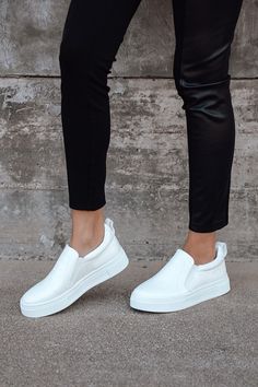 Your classic sneaker gets a major upgrade with the Lulus Cassay White Crocodile-Embossed Platform Slip-On Sneakers! Shiny crocodile-embossed faux leather shapes these slip-on sneakers that have a rounded toe upper and elastic gussets for fit. Pull tab at back. 1.5"" white bumper sole. Lightly cushioned insole. Rubber sole has nonskid markings. All Man Made Materials. Imported. Lulus | Cassay White Crocodile-Embossed Platform Slip-On Sneakers | Size 11. White Rubber Shoes Outfit Woman, White Slip On Shoes Outfit, Slip On Sneakers Outfit Summer, Slip On Shoes Outfit, Classy Sneakers, Elegant Sneakers, White Crocodile, Sneakers Outfit Casual, White Slip On Sneakers