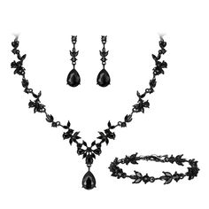 a black necklace and earring set with flowers on the bottom, along with matching earrings