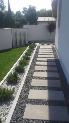 an outdoor walkway with stepping stones and grass in the background, is featured on this page