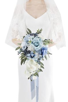 PRICES MAY VARY. Size: 18 inches high, 11 inches in diameter. Material: The main flowers of the wedding bridal rose bouquet are silk dusty blue roses, dotted with white rose, navy roses, orchid, anemone, beriies, acrylic crystal, eucalyptus leaves ,white daisy. Delicate Dusty Blue Wedding Bouquets: the bouquet comes in elegant, romantic and tender tones: dusty blue, light blue, grey, white, navy blue and green. These neutral colors are subtle and roamntic, they attract with their coziness and fe Teal Wedding Bouquet, Winter Wedding Flowers Bouquets, Bouquet For Wedding, Vintage Boho Wedding, Bridal Bouquet Blue, Cascading Bridal Bouquets, Eucalyptus Bouquet, Wedding Party Flowers, Blue Wedding Bouquet