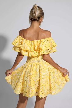 Amora Yellow Cutout Ruffle Mini Dress Strapless Flirty Dress With Smocked Back, Flirty Strapless Dress With Smocked Back, Bandeau Beach Dress With Ruffles, Strapless Mini Dress With Smocked Bodice For Party, Strapless Ruffled Dress For Vacation, Strapless Ruffle Dress For Vacation, Strapless Dress With Ruffles For Vacation, Strapless Dress With Smocked Back For Date Night, Elegant Off-shoulder Ruffled Dress For Day Out