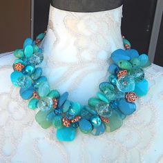 I got the inspiration for this collar from a picture of Princess Sophia wearing a Famous Designer Necklace. Instead of the Classic Pearls I chose to make it with large acrylic beads and other turquoise beads that provide drama but no WEIGHT! I also used copper glass beads. It makes a very bold statement. Measures - You Choose. It has a lovely magnetic clasp for easy attachment.. Get ready for compliments!!! This necklace has The Iris Apfel Wow Factor for sure! Free US Shipping! Are you ready for Bulky Necklaces, Beaded Baubles, Bridal Statement Necklace, Princess Sophia, Tinkerbell Party, Turquoise Statement Necklace, Birthday Party Centerpieces, Flower Statement Necklace, Twisted Sister