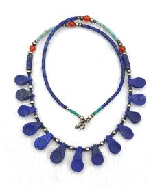 This Beautiful Lapis Lazuli And Turquoise Necklace is 18 inches long Size Details Pictures Are Listed Above. Good Conditions As Shown In The Pictures. Some Lapis Beads Are In Good Color And In Good Conditions Looks Like Recently Buffed Polished. We Provide Fast And Free Shipping Service World Wide To Our Customers .We Ship Mostly Via Fedex And DHL. If You Have Any Questions Please Feel Free To Send Us Message. Blue Lapis Lazuli Jewelry For Festivals, Blue Turquoise Teardrop Necklace With Gemstone Beads, Bohemian Teardrop Necklaces With Polished Beads, Bohemian Teardrop Necklace With Polished Beads, Blue Teardrop Gemstone Beaded Necklaces, Blue Teardrop Gemstone Beads Necklace, Bohemian Lapis Lazuli Teardrop Jewelry, Blue Teardrop Polished Bead Necklaces, Blue Teardrop Gemstone Bead Necklaces