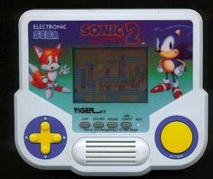 an old gameboy with sonic the hedgehog on it