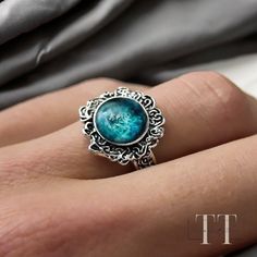 --Description✍️-- Embrace the allure of the moonlight with this captivating Elden Ring Dark Moon Ranni Ring! Inspired by the iconic Dark Souls Cold Oath Ring, this adjustable gem features a  crescent moonstone, channeling the ethereal energy of Ranni the Witch. Handcrafted from sturdy brass, this vintage-inspired design exudes a timeless charm, perfect for fans of the Elden Ring universe or anyone seeking a touch of mystical elegance. Wear it as a reminder of Ranni's enigmatic quest, or let it i The Elden Ring, Ranni The Witch, Enchanted Jewelry, Elden Ring, Power Crystals, Dark Moon, Vintage Inspired Design, Dark Souls, Vintage Ring