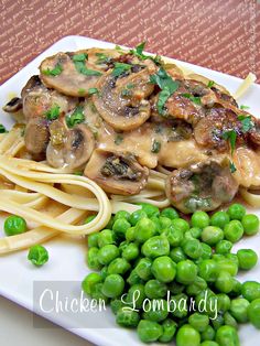 pasta with mushrooms and peas on a white plate