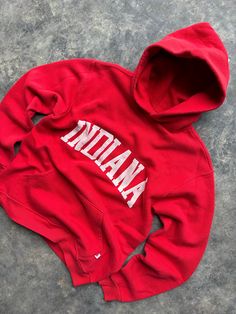 Vintage 90's Indiana University Russell Athletic Crewneck Sweatshirt Hoodie   Size Medium Measures 21" x 25" Great vintage shape Super soft & comfy  Any questions feel free to reach out! Hooded Tops With Letter Embroidery For Streetwear, Collegiate Sweatshirt With Letter Embroidery For Streetwear, Collegiate Style Sweatshirt With Letter Embroidery For Streetwear, Vintage Letter Embroidery Sweatshirt For Streetwear, Throwback Cotton Sweatshirt With Embroidered Logo, Vintage Crew Hoodie For Winter, Vintage Crew Neck Winter Hoodie, Vintage Winter Crew Hoodie, Casual Sweats With Embroidered Logo