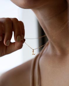 This 14k solid gold initials necklace offers timeless sophistication, perfectly suiting the modern minimalist. Its chic and delicate design adds a personalized touch to any outfit, allowing you to express yourself in a subtle yet meaningful way. Layer it with favorite necklaces for a unique and meaningful statement. Make it yours with a personalized touch. * Initial measures approx. 7mm * 14k yellow gold * Chain Length: 16" or 18" * Leave us your initials and placement in the comment box at chec Minimalist 14k Rose Gold Initial Necklace, Minimalist Yellow Gold Initial Pendant Necklace, Gold Minimalist Initial Necklace, Elegant 14k Gold Name Necklace For Everyday, Minimalist Gold Name Necklace, Elegant Initial Pendant Name Necklace For Everyday, Everyday 14k Gold Initial Pendant Name Necklace, Elegant Everyday Initial Pendant Name Necklace, Minimalist 14k Gold Filled Charm Necklace With Initial Pendant