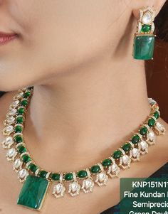 Green Kundan set is inspired by Sabyasachi and features Polki Jadau craftsmanship. The double-layered, gold-plated necklace boasts Emerald Moissanite Polki diamonds, creating a stunning statement piece. Perfect for gifting, this luxurious necklace embodies the rich heritage and artistry of India. *𝐏𝐑𝐎𝐃𝐔𝐂𝐓 𝐃𝐄𝐓𝐀𝐈𝐋* * Material: Brass * Plating: Gold Plated. * Stone: Semi Precious Kundan, Polki, Stones & Emerald. *𝐃𝐈𝐒𝐂𝐋𝐀𝐈𝐌𝐄𝐑* Product color may slightly vary due to photographic Designer Gold Kundan Necklace, Designer Gold Kundan Necklace For Gift, Luxury Kundan Necklace With Meenakari For Celebration, Designer Gold Necklaces For Festive Season, Designer Gold Necklaces For Festivals, Designer Gold Necklace For Festive Occasions, Designer Kundan Gold Necklaces, Designer Gold Kundan Necklace For Festive Occasions, Exquisite Kundan Necklaces For Festive Occasions