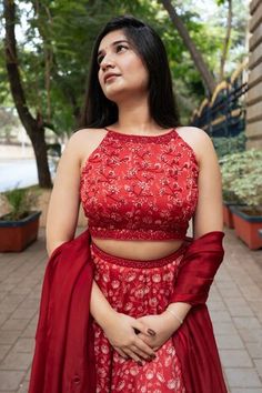 Red attached cancan lehenga with all over floral print. Paired with a padded blouse with placed hand embroidery and dupatta with mirror work hand embroidery. - Aza Fashions Sleeveless Art Silk Traditional Wear For Wedding, Red Sleeveless Lehenga For Weddings, Sleeveless Red Lehenga For Wedding, Semi-stitched Sleeveless Wedding Sets, Red Lehenga For Wedding, Red Sleeveless Choli For Reception, Sleeveless Red Choli For Reception, Sleeveless Lehenga With Unstitched Blouse For Wedding, Sleeveless Red Lehenga For Diwali