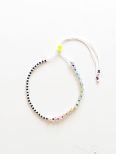 🌈Add a touch of magic to your day with this enchanting moonstone bracelet, featuring a single luminous pearl and vibrant rainbow-colored Miyuki beads. The moonstone's soothing glow pairs beautifully with the pearl's elegance, creating a sense of calm and balance. The playful rainbow Miyukis add a splash of color and joy, making this bracelet a delightful accessory for any occasion. Adjustable and easy to wear, it's perfect for adding a little sparkle and warmth to your everyday life. MATERIALS: 🌈Miyuki sead beads 🌈2 mm Moonstones 🌈Culture Pearl 🌈Adjustable and Durable Rope 🌈Pearl always makes you feel special and precious. 🌈Moonstone is known for its calming and soothing properties, helping to reduce stress and balance emotions. Often called the "Stone of New Beginnings," it encoura Bracelet Love, Bracelet Miyuki, Minimal Bracelet, Pride Bracelet, Miyuki Bracelet, Everyday Bracelet, Love Is, Moonstone Bracelet, Unisex Bracelets