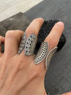 You can choose between 4 different and unique sterling silver rings. Each has a different style and design, but all are perfect for your day by day outfits and super comfy and easy to match with other accessories and any outfit. In one of the pictures you can see a number that represents each ring for you to choose from. Ring #1- Size 8.75, can be open to a bigger size but this will create a gap in the front. And the ring is 2.7cm- 1.10 inch long Ring #2- Size 8.5 , can be open to a bigger size Vintage Open Ring With Unique Design, Silver Toe Ring With Unique Design, Silver Open Ring Midi With Unique Design, Artistic Sterling Silver Rings With Artistic Design, Unique Handmade Wide Band Rings, Silver Open Ring Midi Rings With Unique Design, Bohemian Metal Rings With Unique Design, Silver Open Ring With Unique Design, Handmade Artistic Promise Ring