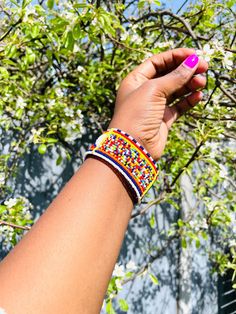 Handmade Africa beaded multi Unisex bracelet bangle.  This lovely bangle are made from glass beads.  Do not stretch or adjustable. Made in Kenya by the Masai Tribe. Unique gift. NOTE; THE BANGLE MEASUREMENTS ARE TAKEN WHILE THE BANGLE IS NOT FASTENED. All BRACELET MEASURING 8 INCHES LONG X 1.2 INCHES WIDE. Colourful Bangles, Masai Tribe, Masai Jewelry, Africa Kenya, Colorful Bangles, Bead Bangles, Maasai, Unisex Bracelets, Bracelet Bangle